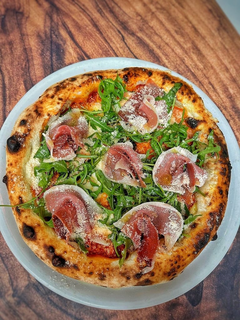 Trattoria Lalis Pizza Lalis with prosciutto, fresh arugula and parmesan